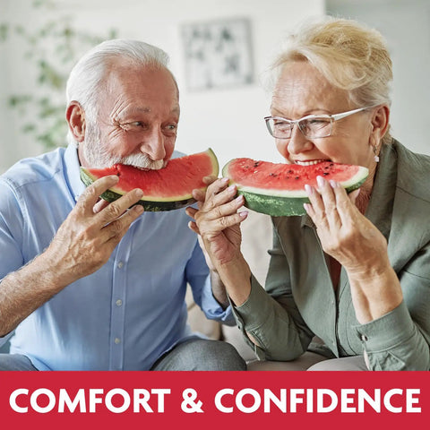 Elderly couple enjoying watermelon with secure comfort from Original Flavor Denture Adhesive Seal For Lower Dentures, Zinc Free, All Day Hold.