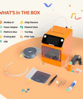 Kid Safe Mini 3D Printer With Enclosed Design, One Click Printing, WiFi And App Control unboxed with accessories like filament and tools