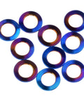Badass Grade 5 Titanium Flat Washers For M5 Metric Bolts With Burnt Blue Finish 10 Pack shown from above, featuring vibrant colors and precise design.