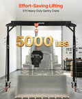 Height Adjustable Gantry Crane 5000 Lbs Capacity Rock Solid Portable Shop Lift Hoist With Manual Trolley And Locking Casters Heavy Duty Steel Frame Built Like A Tank For Garage And Workshop in use with engine overhead.