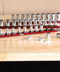 15.5 Inch Red Twist Lock Magnetic Socket Rail Set for toolbox organization, holds 36 sockets, shown on a wooden workbench.