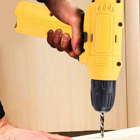 No Sweat Cordless Drill Set With Cushioned Anti Slip Handle drilling into wood, featuring yellow and black design, ergonomic grip.