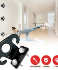 Badass Heavy Duty 4 Pack Resistance Band Wall Anchors For Home Gym Workout Exercise Fitness Physical Therapy And Compact Studio Training Gear Black Finish on wall with user exercising.