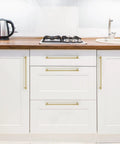 No Cap Required With These Brushed Gold Kitchen Cabinet Pulls Featuring 12 And 3/5 Inch Hole Centers Bang For Your Buck Zinc Alloy Drawer Handles For Total Space Glow Ups In A 5 Pack Bundle on white cabinets.