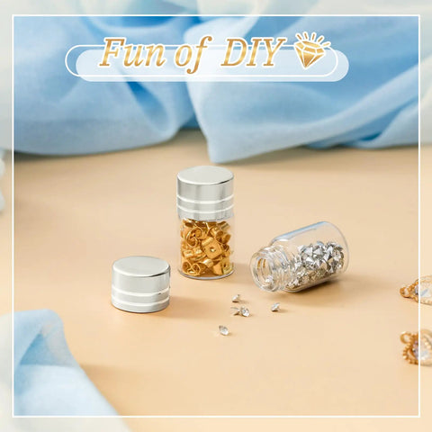 Grab This Top Shelf Haul Of Clear Two Milliliter Mini Glass Vials With Heavy Duty Silver Caps For Travel Cosmetics Diy Builds And Tight Sealing Essential Oil Storage With A Killer Natural Vibe - displaying two vials with silver caps, one filled with gold embellishments.