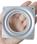 18 Pack Square Lazy Susan Hardware Four Inch Heavy Duty Zinc Steel Swivel Bearings held in hand, showing detailed structure.