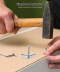 Hand using hammer with 24 Piece Galvanized Steel Toggle Bolt Kit For Drywall Heavy Duty Anchors With Wing Nuts Easy Install