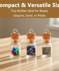 Mini Glass Bottle Charms With Corks And Eye Screw Caps Includes Tiny Dropper Vials For Diy Necklace And Keychains filled with beads, glitter, and sand.
