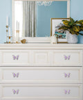 Butterfly Cabinet Knobs Set For Cabinets And Drawers With Single Hole Pulls Enamel Crystal Edge Zinc Alloy Hardware In Purple 6 Pack on white dresser