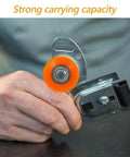 Heavy Duty Nylon U Groove Pulley Wheels With Micro Ball Bearings Built Like A Tank Super Quick Snap Install Durable Track Guide Rollers For Any Cart Or Machine Five Pack held in hand, showing orange nylon wheel and metal mount.