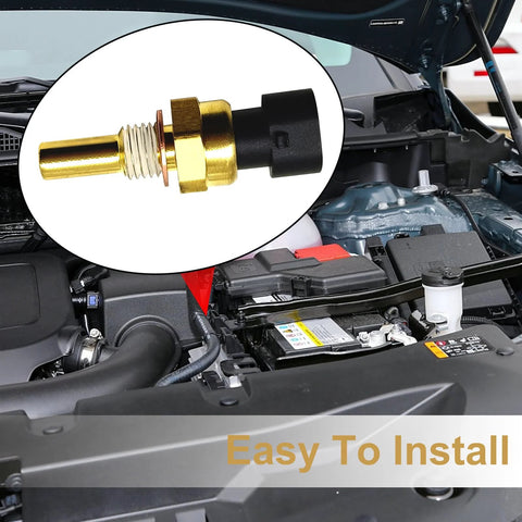 Engine coolant temperature sensor, brass body with threaded tip and black plastic connector (close-up view).