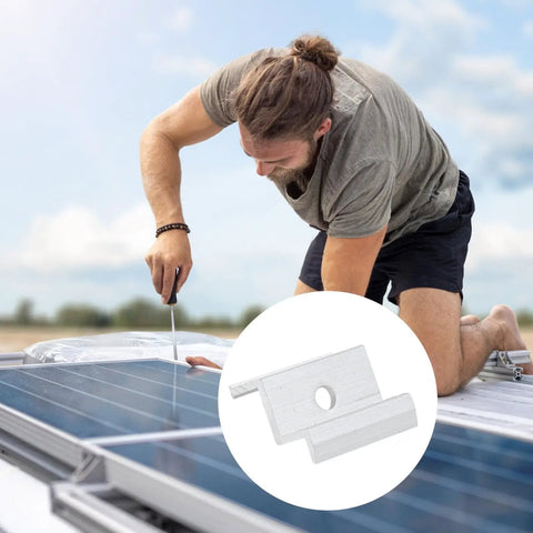 Man installing Heavy Duty Aluminum Solar Panel Clamps Rock Solid Outdoor PV Mount Brackets on rooftop solar panels.