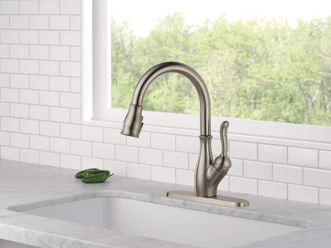 Leland Single-Handle Pull-Down Kitchen Faucet With ShieldSpray in stainless finish, installed on a modern countertop.