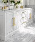 20 Pack Built Tough Brushed Brass Gold Kitchen Cabinet Pulls 5 Inch Heavy Duty Drawer Handles on white vanity.