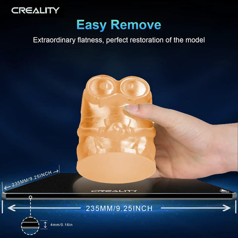 Hand holding a 3D printed model on Upgraded Tempered Glass Build Plate For 3D Printers Featuring Easy Release Coating High Hardness Durable Platform Compatible With Enders.