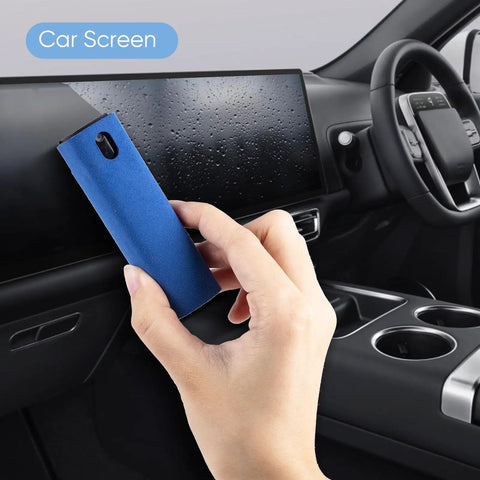 Hand using 6 Pack Screen Cleaner Kit 2 In 1 Touchscreen Mist Cleaner on car dashboard screen with microfiber cloth wipe.