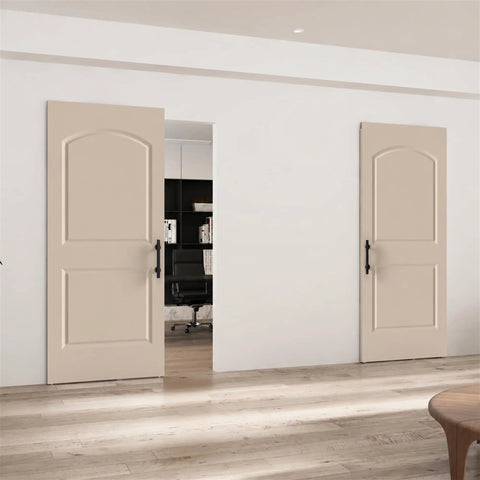 Ready To Paint White Primer Raised Two Panel Sliding Barn Door With Hella Smooth Soft Close Hardware Top Pick For Dropping Into Any Rustic Loft Or Urban Studio Upgrade. Two-panel doors in a light finish.