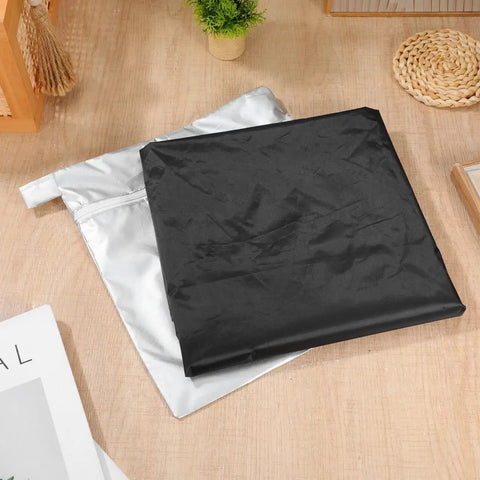 Tough As Nails EV Charger Station Cover Waterproof Rainproof Dustproof Universal Fit black cover laid out on wooden surface.