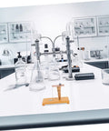 Pendulum Ball Inertia Demonstration Kit for Classroom Physics on lab table, wooden base, metal pendulum, for STEM learning.