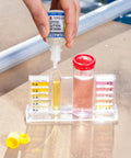 Total Game Changer Swimming Pool And Spa Water Test Kit For Chlorine Bromine Ph And Alkalinity showing testing process with color change.