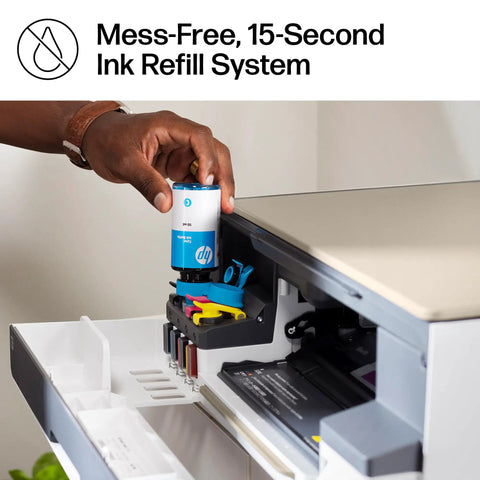 Person refilling Smart Tank 5000 Wireless All In One Ink Tank Printer With Scanner And Copier, Two Years Of Ink Included.