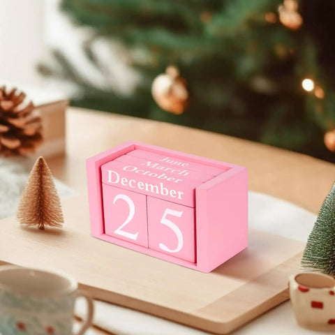 Pink Decor Wooden Desk Calendar Blocks Perpetual Block, 9.4x4.2x5.2 cm, on a festive wooden tray with small decorations.