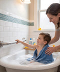 Image of a child using a Super Sturdy 24 Inch Stainless Steel Shower Grab Bar in a bathtub for safe support.