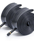 20x2.125 To 2.40 Bike Inner Tubes Two Pack With AV32mm Schrader Valve showing rolled rubber tubes for 20 inch bikes
