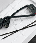 Plug And Play Vcm Deactivator Harness for Honda 3.5L V6 with connectors and zip ties, efficient for smooth commuter rides.