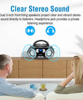Portable CD Player Boombox With FM Radio Bluetooth USB Port And Aux Input For Home Or On The Go on a table with people listening