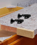Full Overlay Cabinet Door Hinges With Self Closing Soft Close 2 Pack Metal Cabinet Hinges For Kitchen And Furniture Doors With Damping Mechanism By Cabilock displayed on a countertop with mounting screws.
