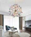 Modern living room with colorful chandelier, white sofa, and round glass coffee table.