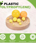 Hardcore 100 Piece Polypropylene Plastic Bearing Balls 5/32 Inch 3.94 mm Yellow G2 on wooden surface showcasing various sizes.