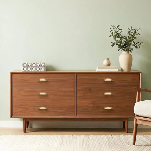 Slick Champagne Bronze Cabinet Pulls With Three Inch Handle Center Solid Zinc Alloy Cup Handles For Kitchen Drawer Refresh on a wooden dresser.