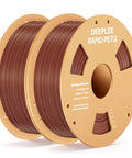Premium 1.75mm PETG Filament Two Kilogram Spool In Bold Brown Color displayed on spools for 3D printing projects.