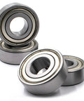 Heavy Duty C3 Spindle Bearings Four Pack Built For Tough Grass Cutting Jobs Synthetic Grease Locked In To Beat The Heat, showing four sealed bearings.