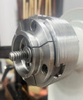 Metal woodturning chuck with Woodworm Screw for secure mounting of bowl blanks, fits most major chucks like Sorby and Nova.