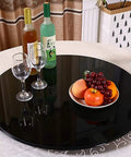 Premium Heavy Black Tempered Glass Lazy Susan Turntable Smooth Rotating Serve Tray For Kitchen Countertops And Dining Tables with fruits and glasses