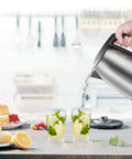 Pouring water from 1.7L Stainless Steel Electric Tea Kettle With LED Light, BPA Free, Auto Shut Off, Boil Dry Protection, 1500W Fast Boil