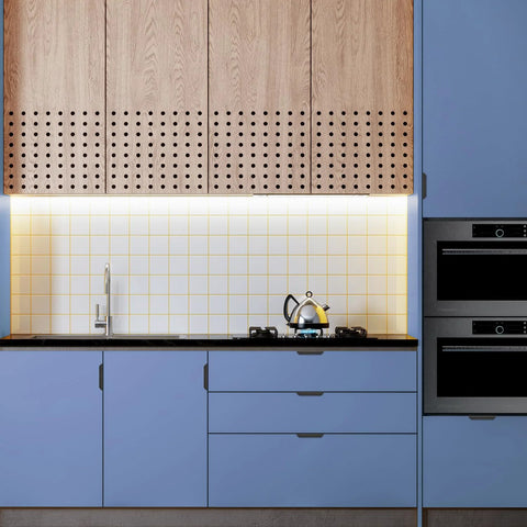 Contemporary kitchen with wooden upper cabinets and sleek concealed handles for drawers showcasing modern design.