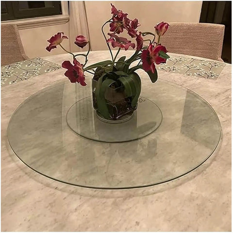 Round Lazy Susan Turntable With Smooth Aluminum Bearings And Heavy Duty Tempered Glass Swivel Serving Tray For House Parties Family Dinners And Holiday Feasts Easy Breezy Cleanup 34 Inch on a dining table with flowers.