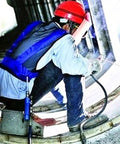 Szydd Cooling Vest Accessory With Belt And Connector For Work And Welding worn by worker during welding in industrial setting.