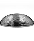 Aged Silver Molten Texture Cup Pulls 3 Inch Hole Centers 6 Pack Vintage Drawer Handles For Kitchen Cabinets And Dressers seen from the side with a textured surface.