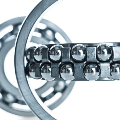 Close-up of Hella Smooth 4Mm 304 Stainless Steel Ball Bearings G100 Precision Grade with shiny, anti-corrosion finish.