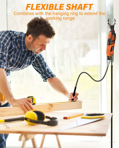 Close-up of a man using Professional Corded Rotary Tool Kit With Flex Shaft And Six Variable Speeds For Engraving Carving And Detail Work 180 Watt Motor.