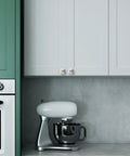 Modern kitchen with cabinets featuring Brushed Satin Nickel Cabinet Knobs 25 Pack For Kitchen Cabinets And Dresser Drawers Zinc Hardware.