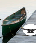 Heavy Duty 4 Inch Black Dock Cleats With Hardware 4 Pack for piers and decks shown securing a canoe to a wooden dock.