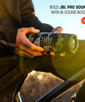 Person holding Bangin Portable Waterproof Speaker With Pro Sound And AI Boost, Deep Bass And Crisp Highs, 16 Hours Of Play, PushLock System.