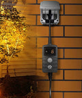 Slick Outdoor Light Timer With Hassle Free Photocell Dusk To Dawn Sensor and weatherproof countdown plug mounted on a wall.