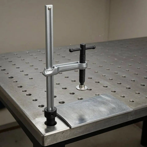 Insertion Clamp Fixture With Quick Release Ratchet Table Clamp For Rock Solid Workholding In Workshop Carpentry And Metalworking Hardened Steel Inserted Tool With 200x100 Base And 16mm T Bar, mounted on perforated metal table